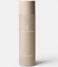 Load image into Gallery viewer, Beige bottle of Danucera Veluxa Body Oil on a white background
